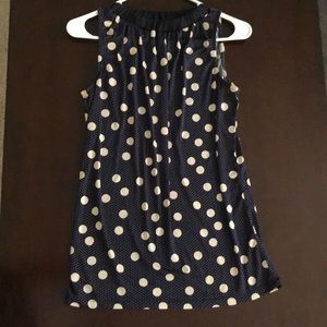 Sleeveless dress shirt. The limited